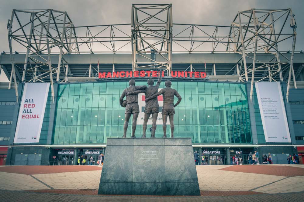 estatua en el estadio Old Trafford